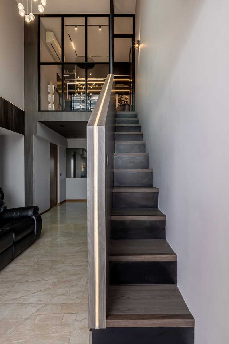Minimalist Living Room with Staircase and Lighting