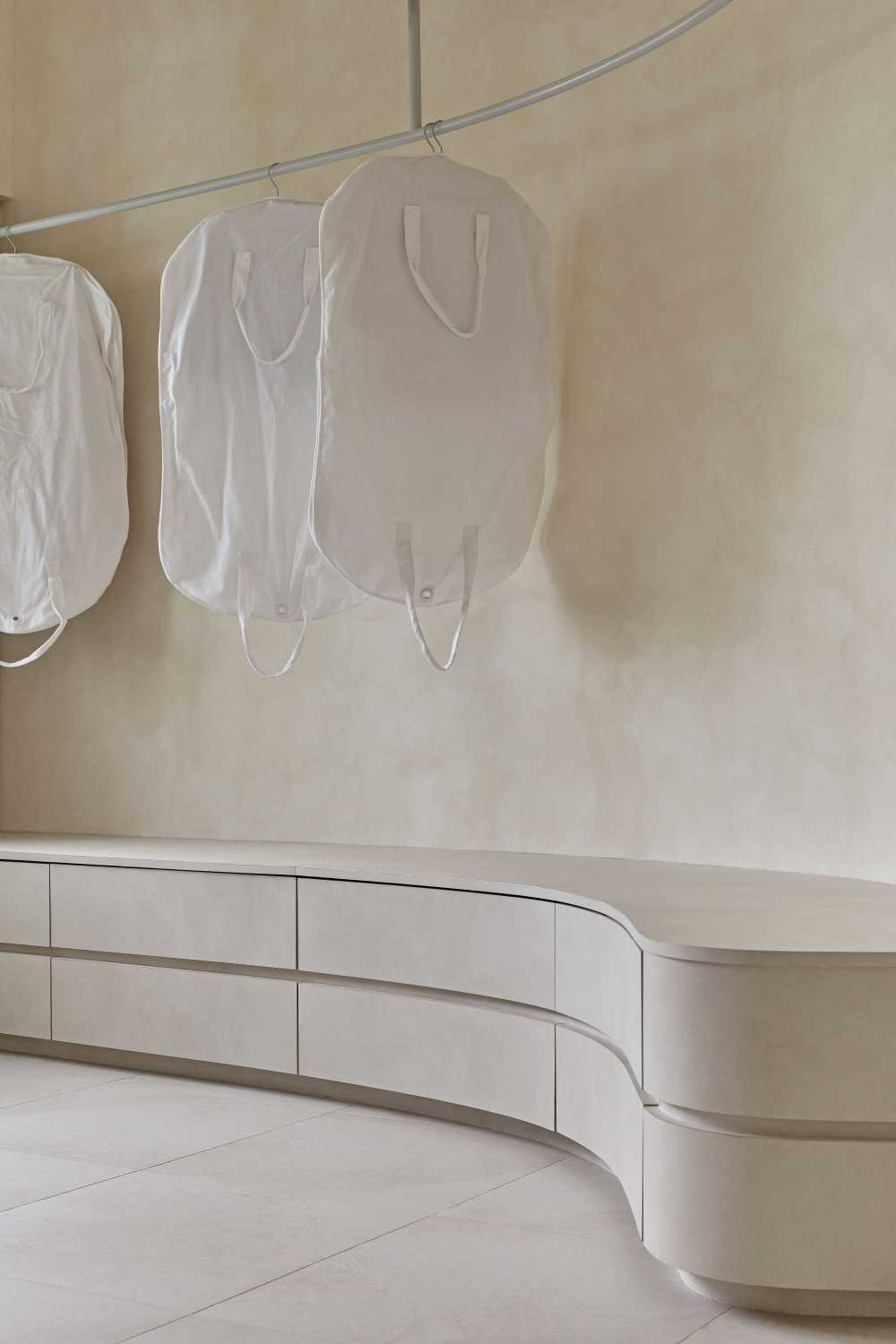 Minimalist Bedroom with Storage Cabinets and Open Storage