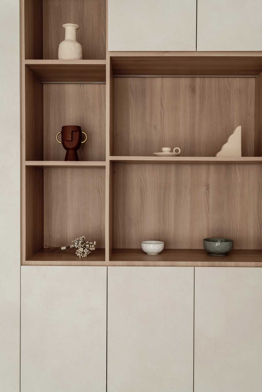 Scandinavian Living Room with Bookshelf and Wood Flooring