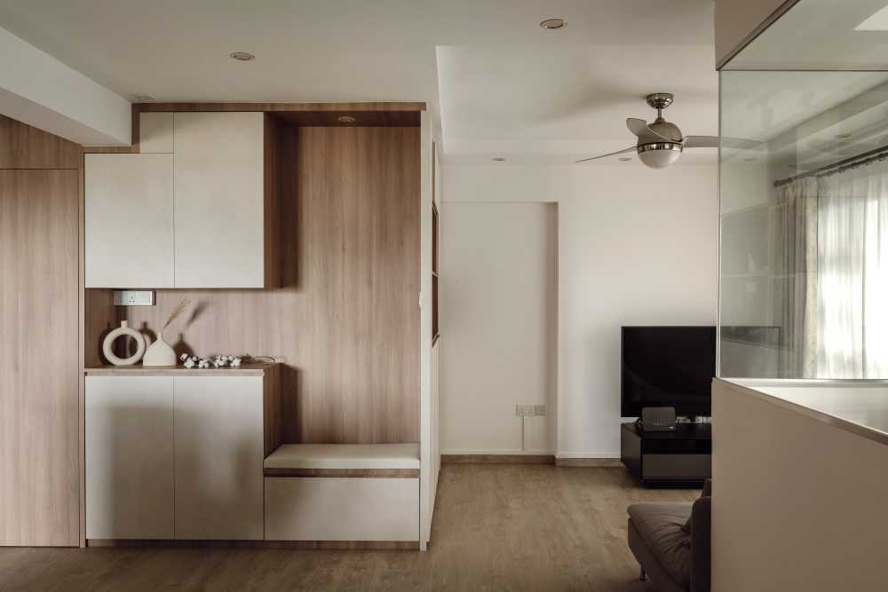 Scandinavian Living Room with Bookshelf and Wood Flooring