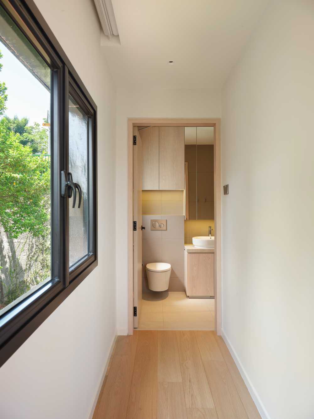 Minimalist Bathroom with Countertop and Mirror