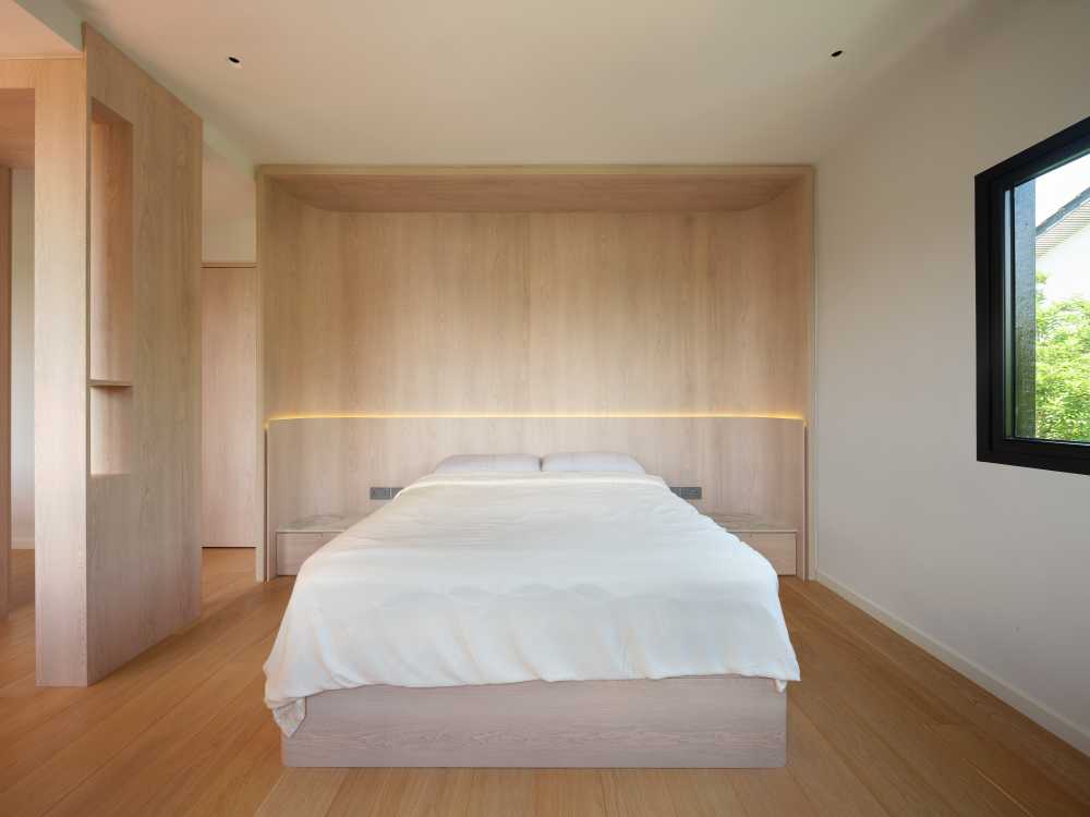Minimalist Bedroom with Parquet Floor and Downlights