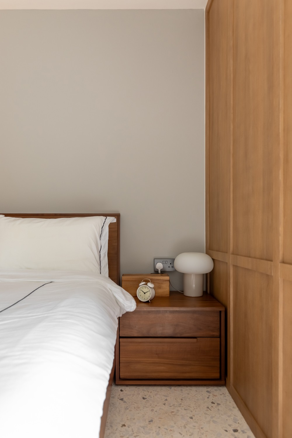 Asian Bedroom with Homogeneous Tiles and Wardrobe