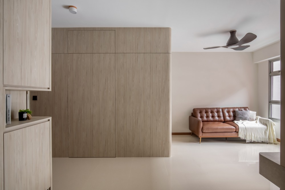 Modern Living Room with Homogeneous Tiles and Feature Wall