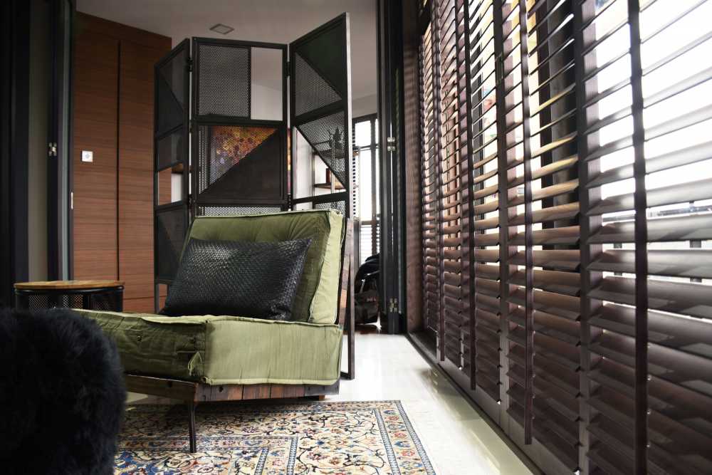 Industrial Living Room with Ceiling Light and Carpet
