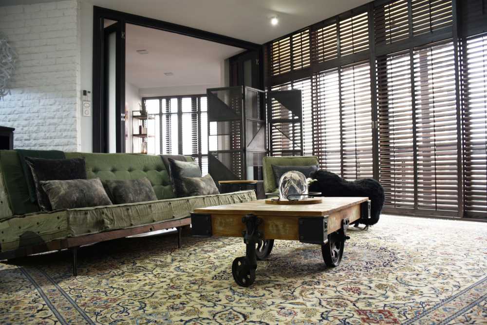 Industrial Living Room with Feature Wall and Carpet