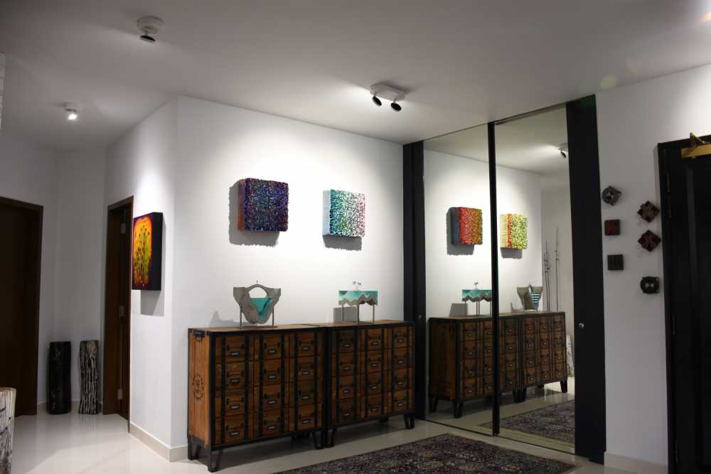 Industrial Living Room with Mirror and Carpet