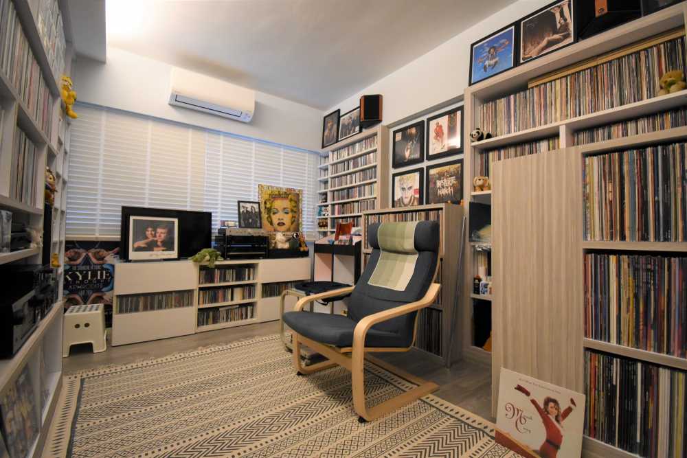 Vintage Home Theatre with Bookshelf and Cove Lighting