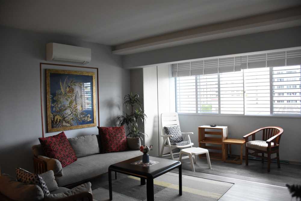 Vintage Living Room with Vinyl Flooring and Paintings