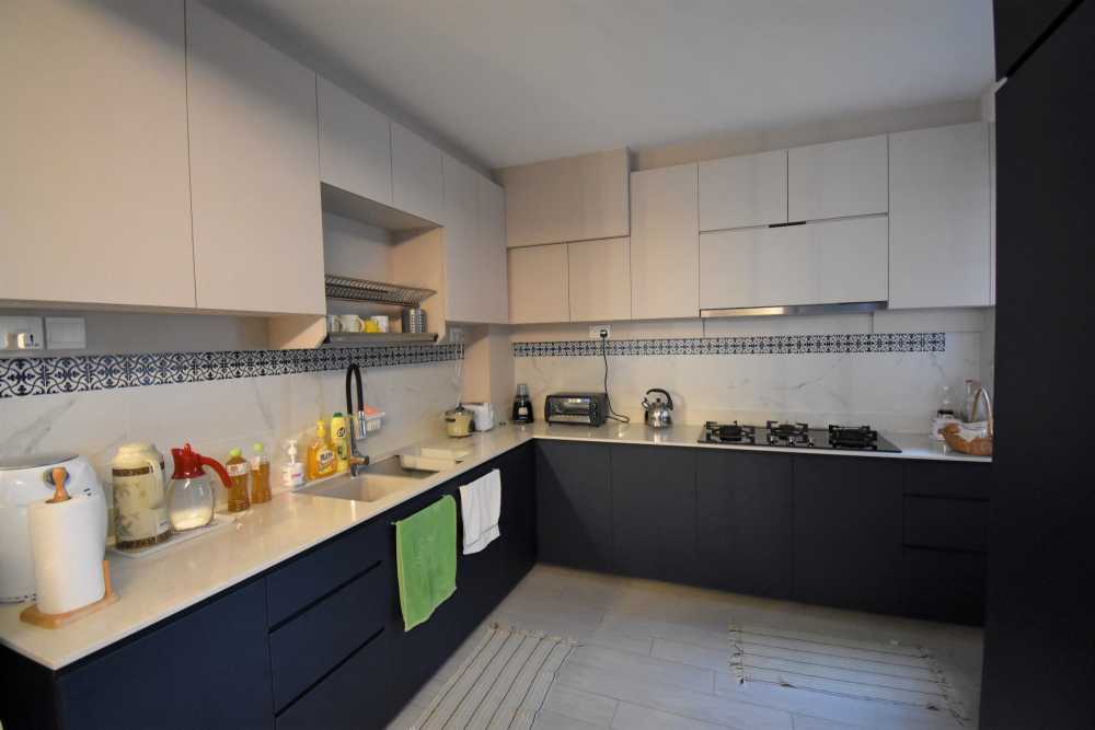Vintage Kitchen with Countertop and Kitchen Backsplash
