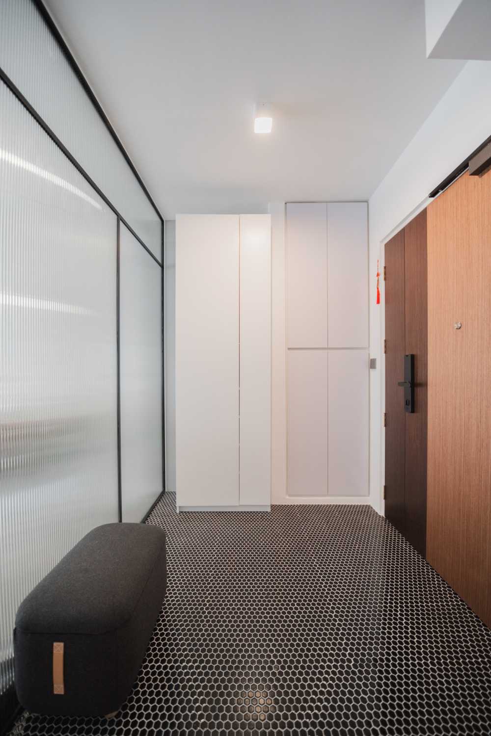 Contemporary Entryway with Glass Door and Mosaic
