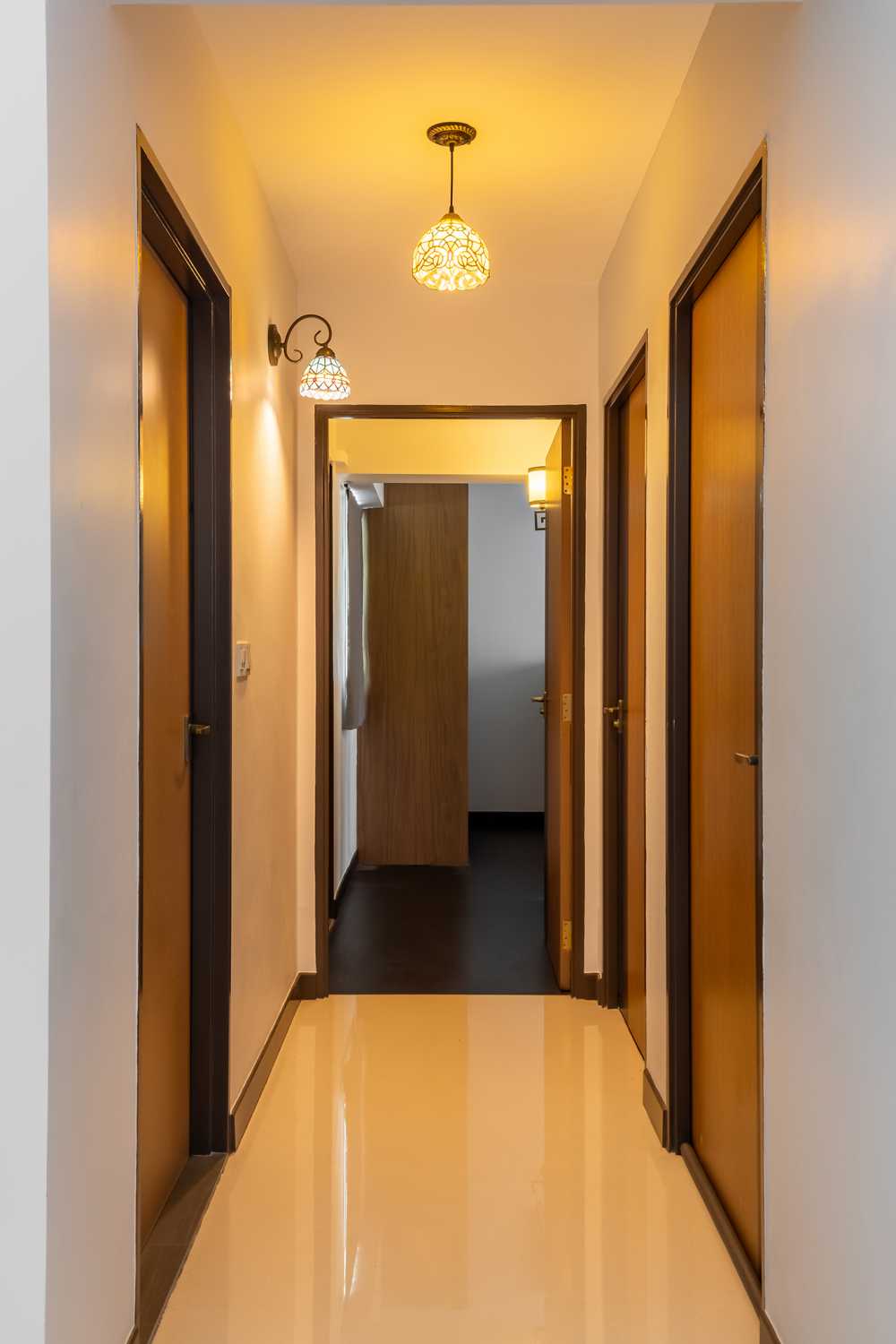 Contemporary Living Room with Homogeneous Tiles and Doors