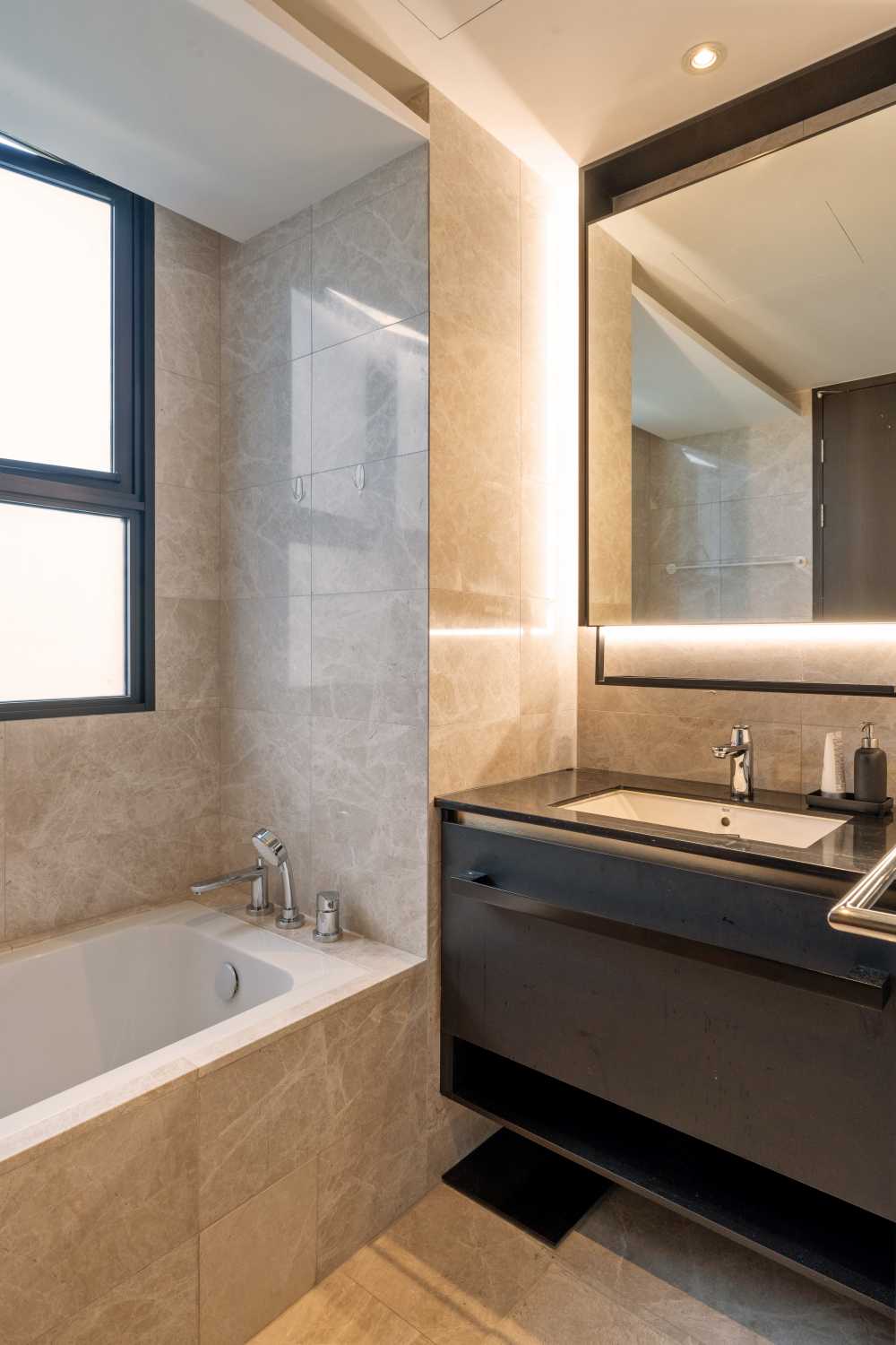 Contemporary Bathroom with Granite Floor and Mirror