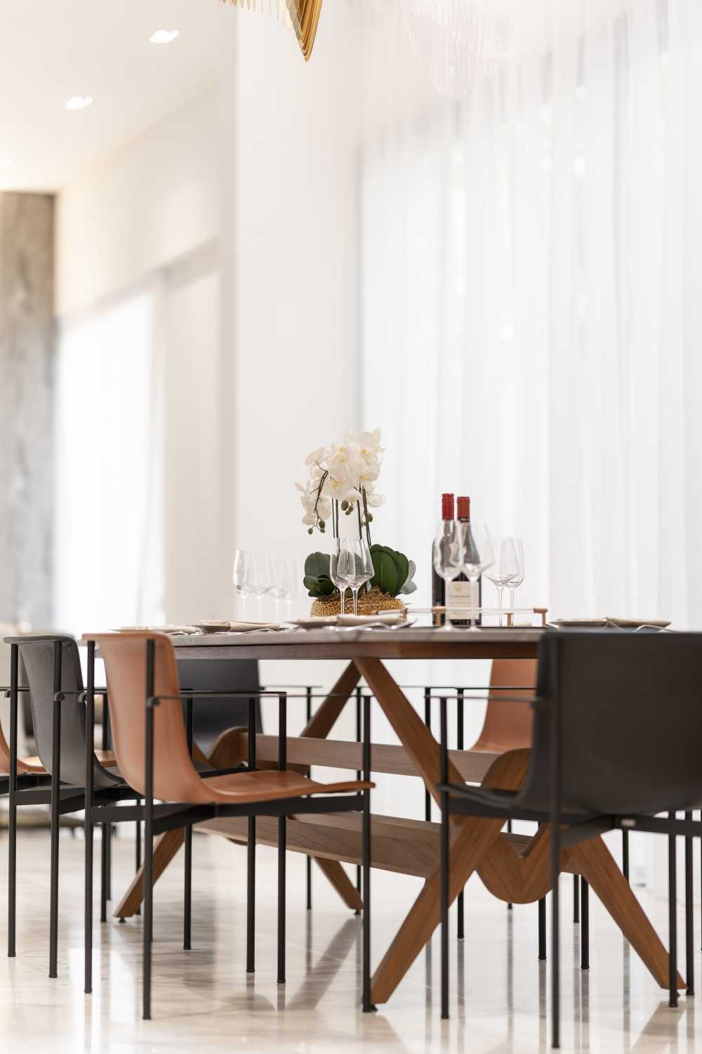 Modern Dining Room with Cove Lighting and Drop Ceiling