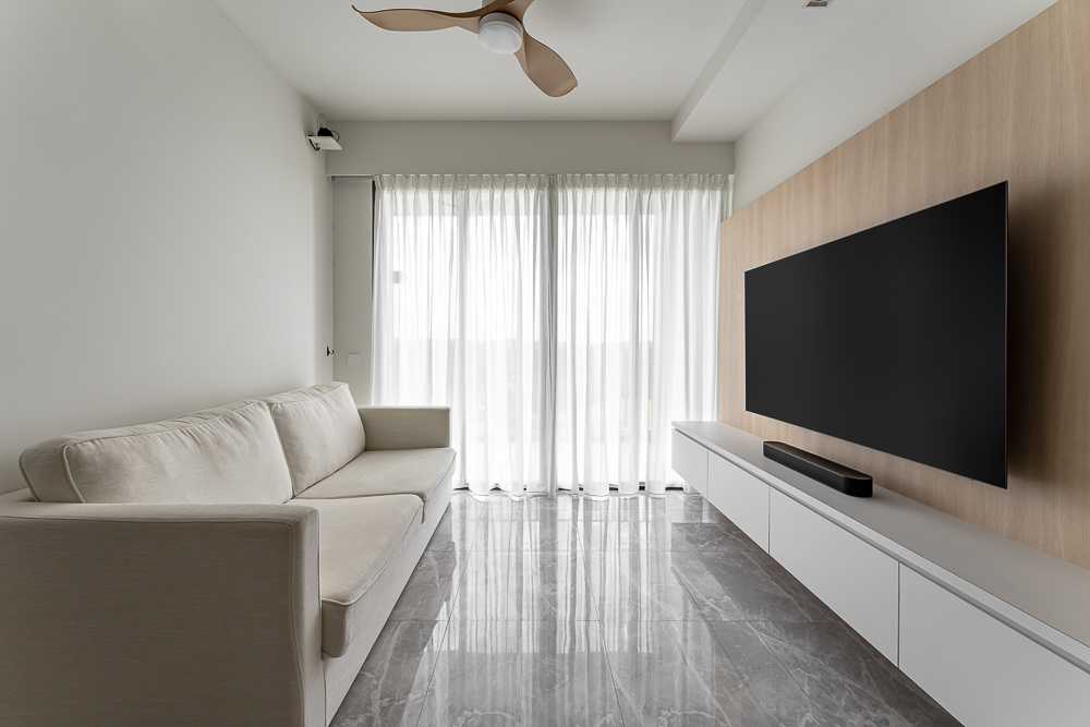 Scandinavian Living Room with Homogeneous Tiles and TV Console