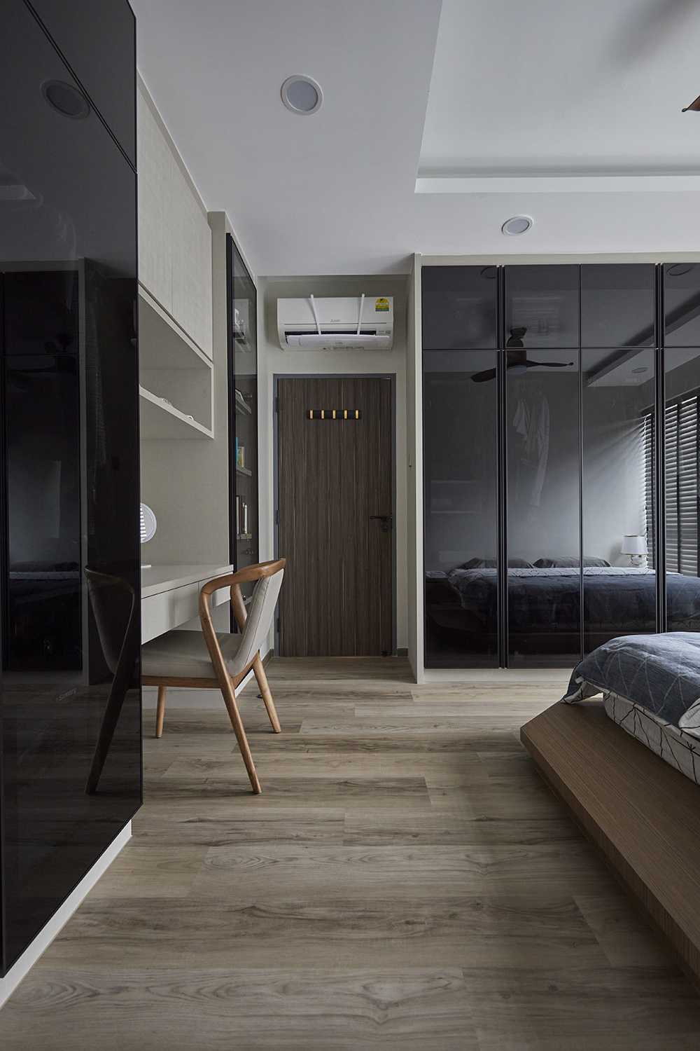 Contemporary Bedroom with Wood Flooring and Cove Lighting
