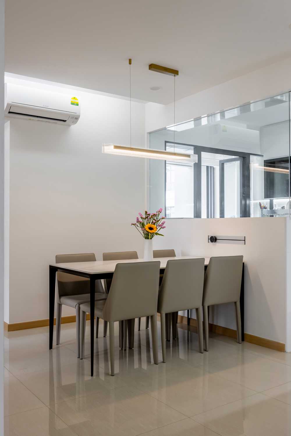 Minimalist Dining Room with Chandelier and Dining Table