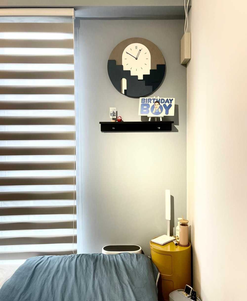 Contemporary Bedroom with Bookshelf and Clock