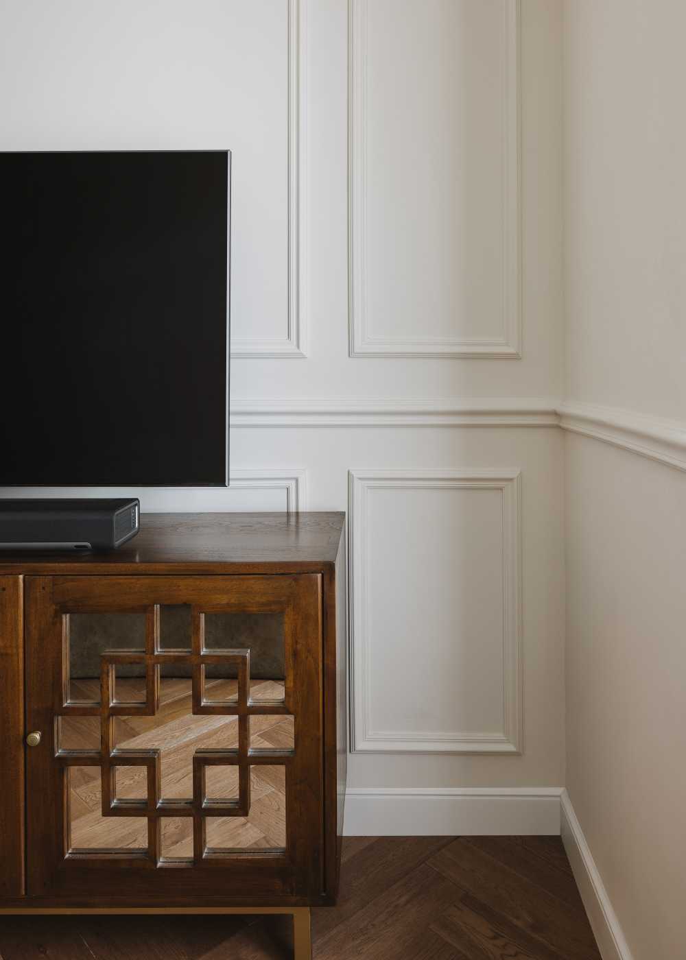Contemporary Bedroom with Wood Flooring and TV Console