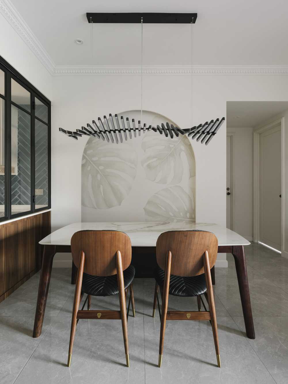 Contemporary Dining Room with Feature Wall and Ceiling Light