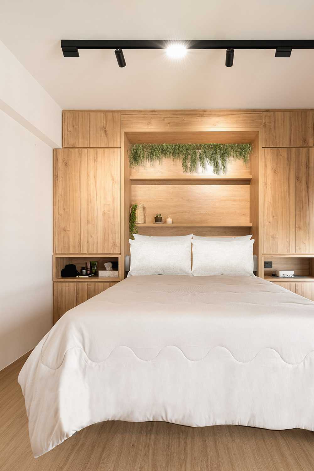 Minimalist Bedroom with Vinyl Flooring and Built-in Bed