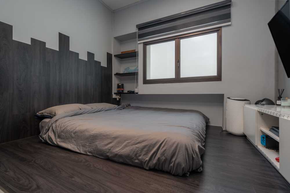 Modern Bedroom with Wood Flooring and Sideboard