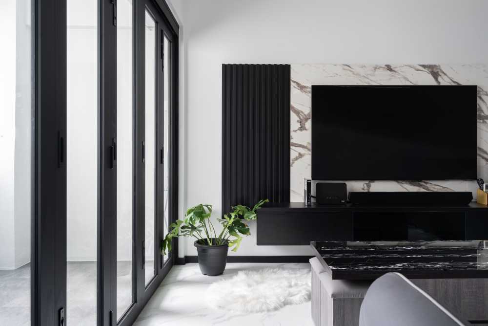 Modern Living Room with Homogeneous Tiles and Feature Wall