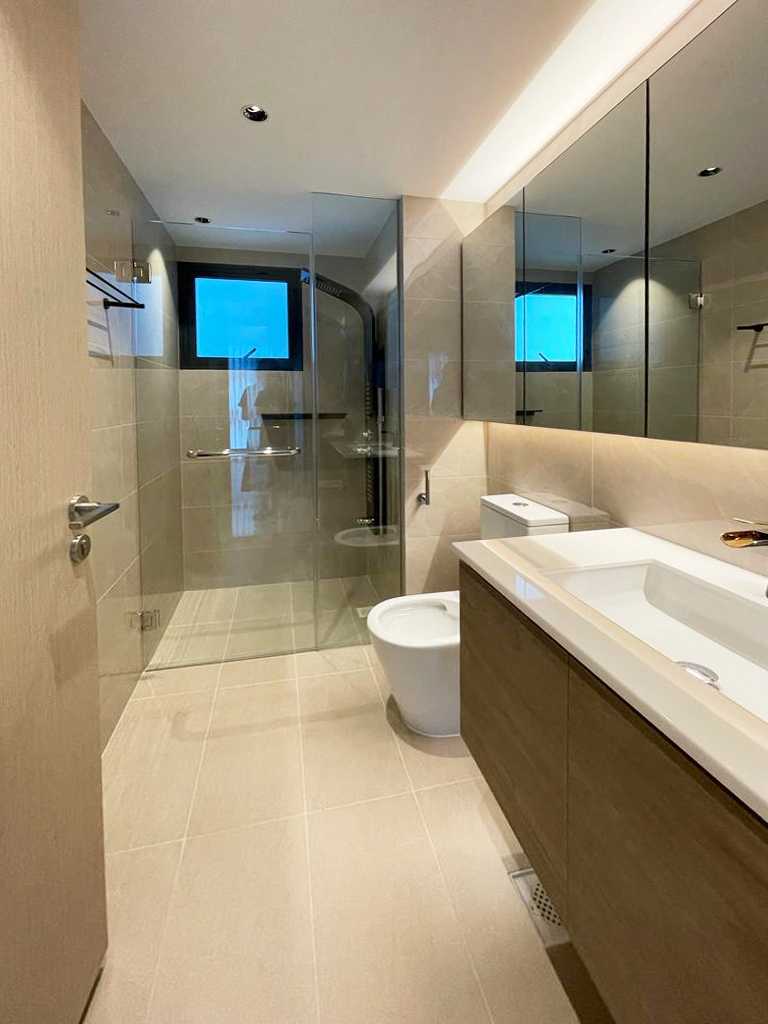 Scandinavian Bathroom with Rainshower and Laundry Baskets