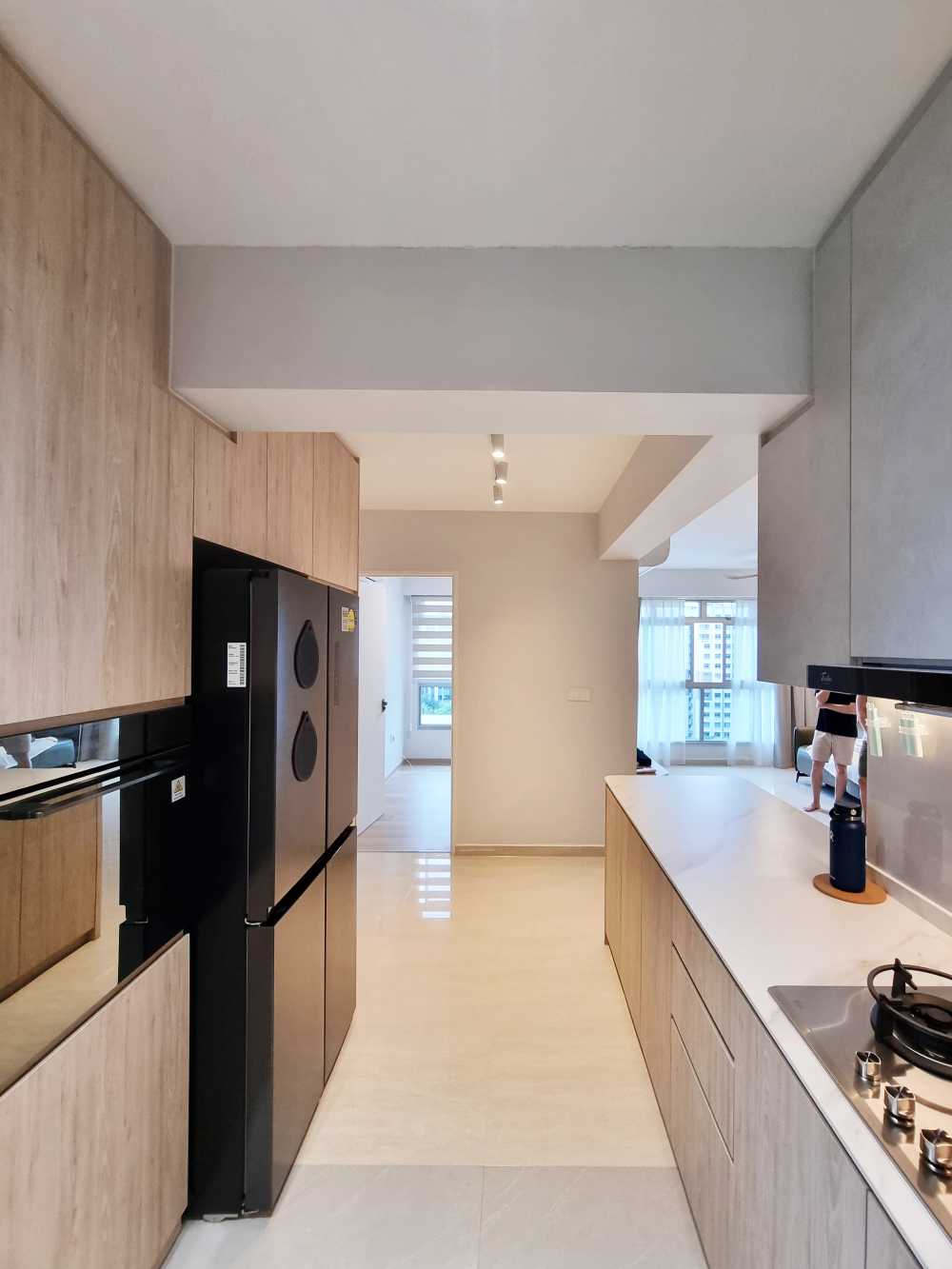 Scandinavian Kitchen with Wood Flooring and Cupboard