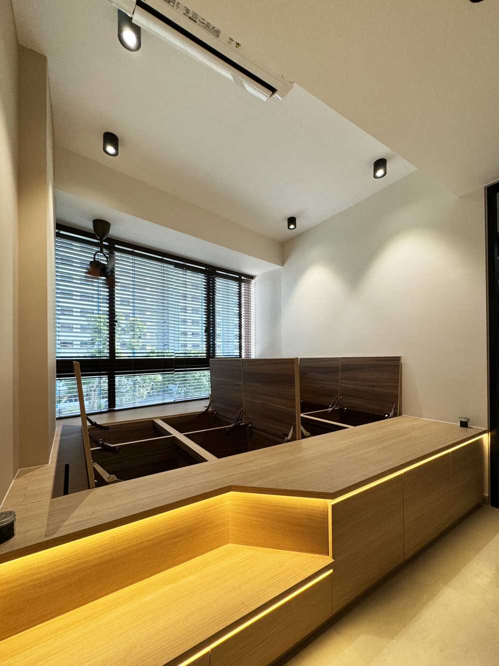 Scandinavian Bedroom with Cove Lighting and Drop Ceiling