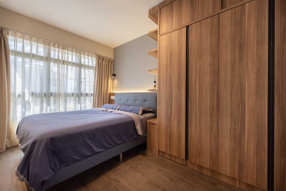 Scandinavian Bedroom with Bookshelf and Wood Flooring