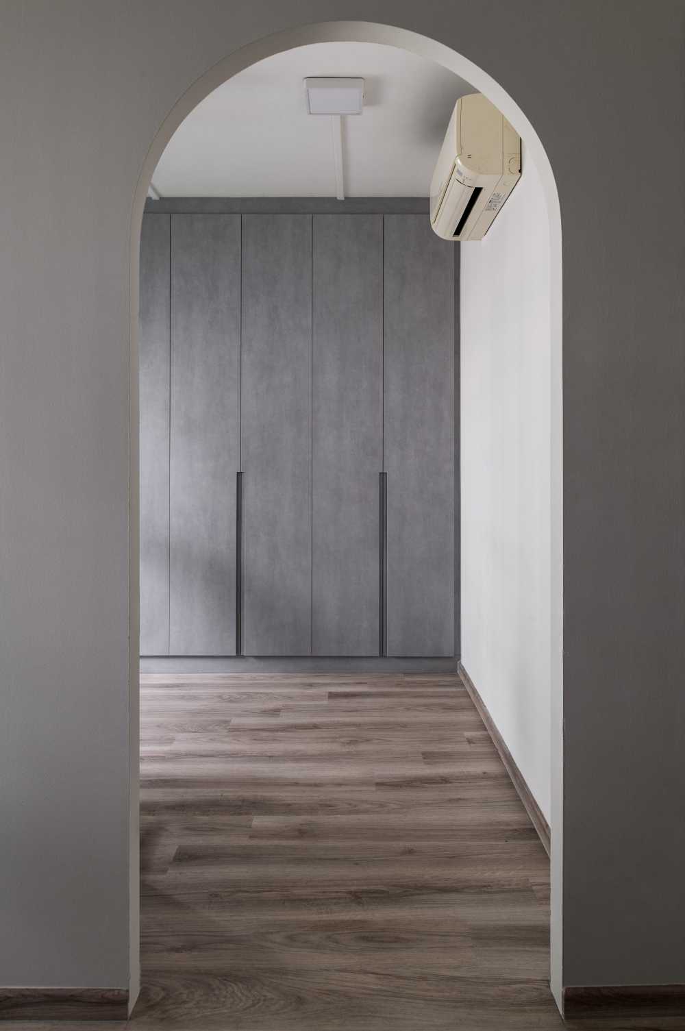 Contemporary Bedroom with Wood Flooring and Ceiling Light