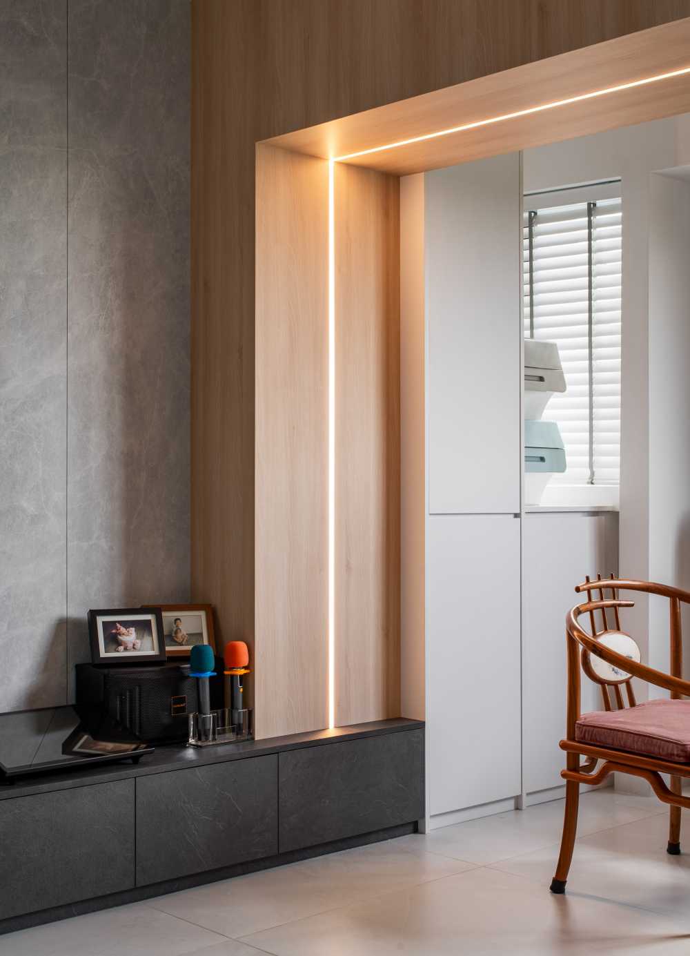 Scandinavian Living Room with Homogeneous Tiles and Storage Cabinets