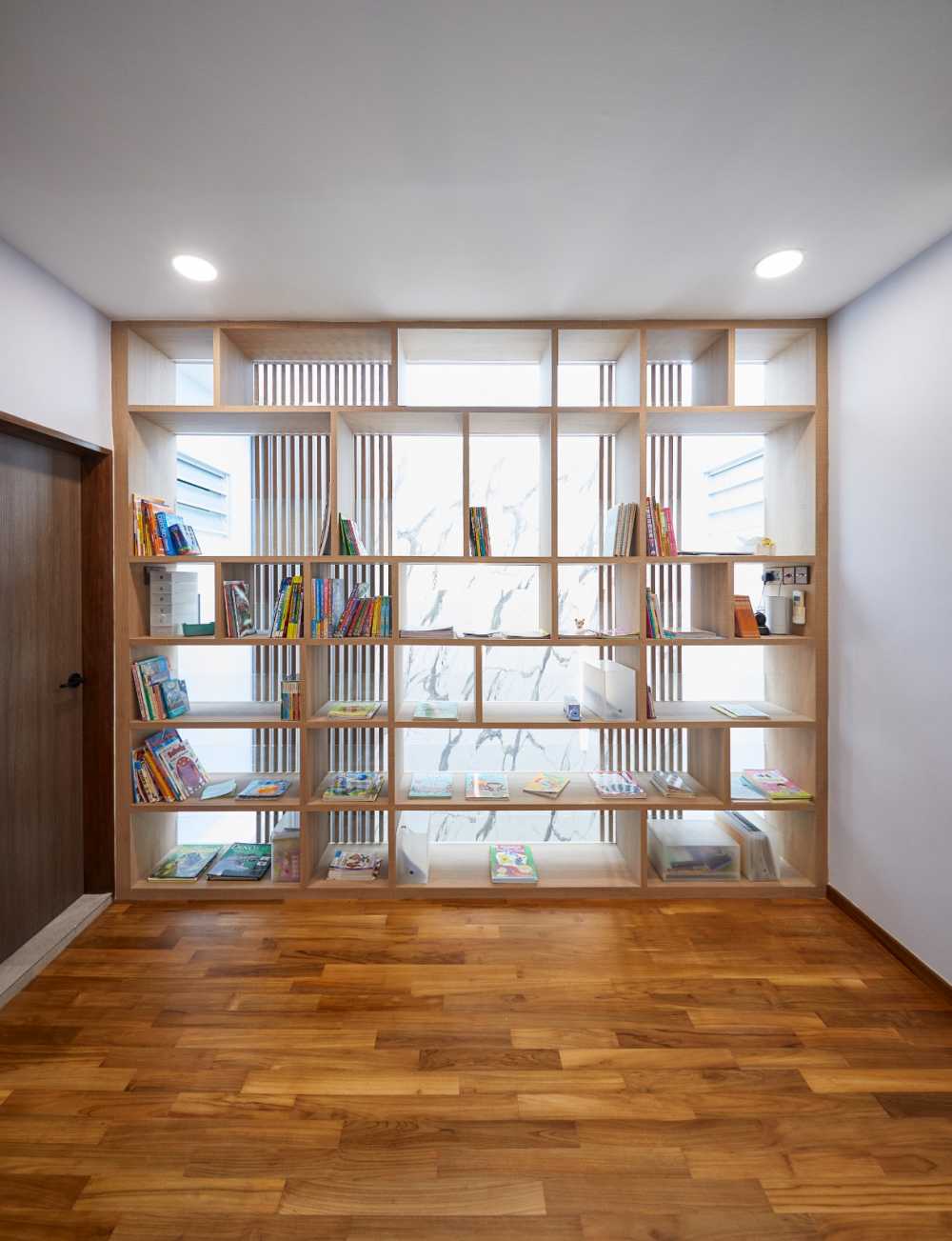 Minimalist Study with Bookshelf and Drop Light