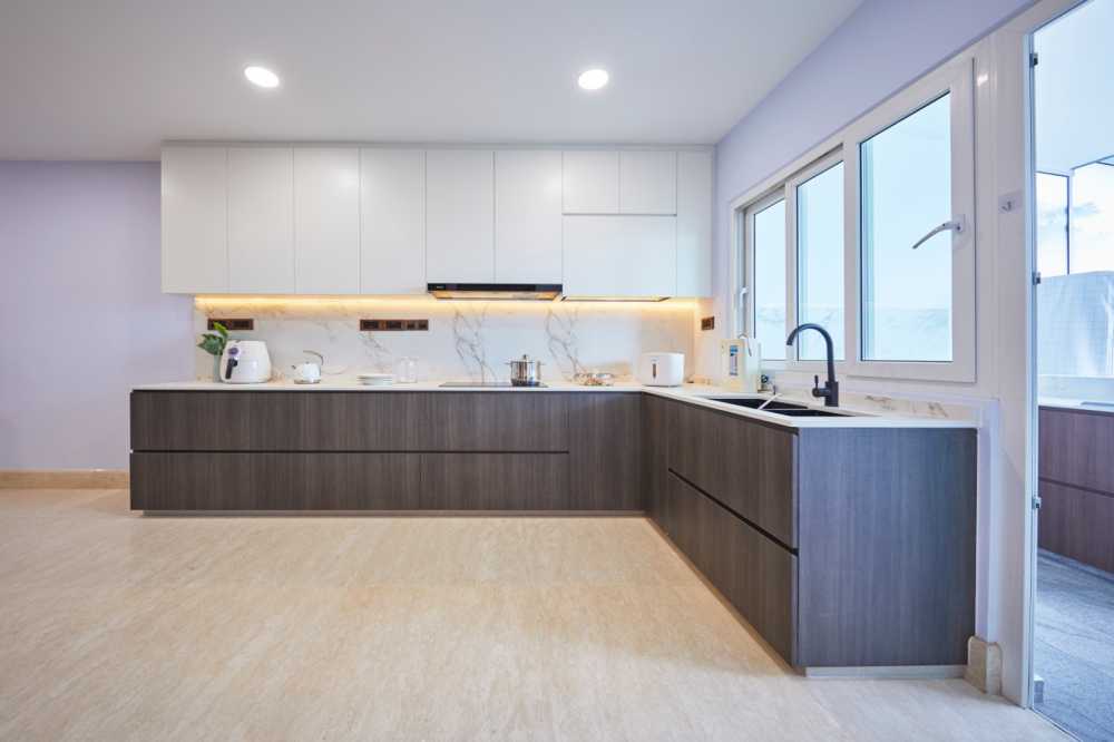 Minimalist Kitchen with Herringbone Tiling and Marble Floor