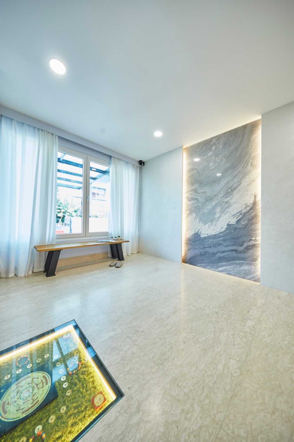 Minimalist Foyer with Artwork and Console Table