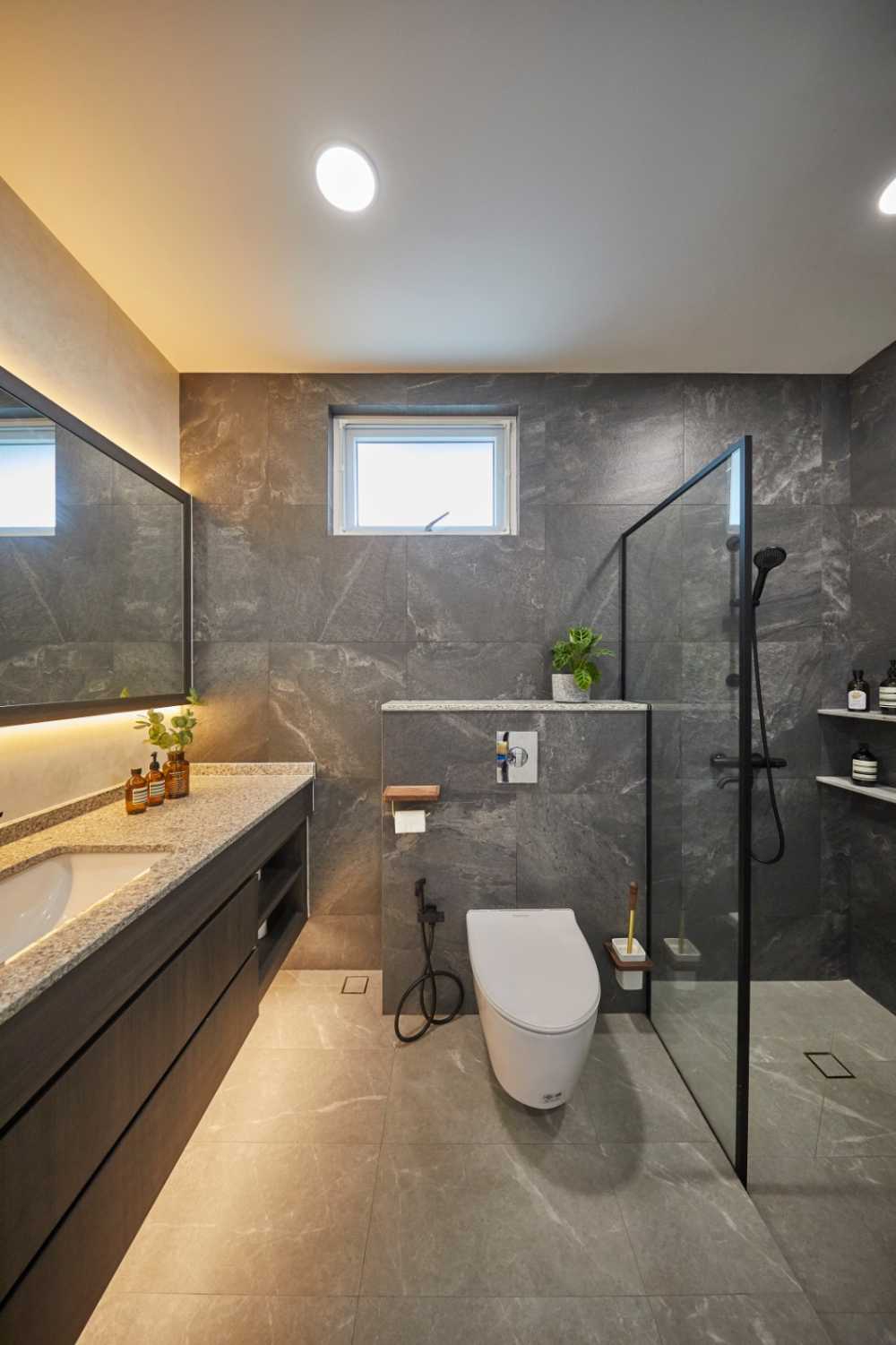 Minimalist Bathroom with Herringbone Tiling and Mirror