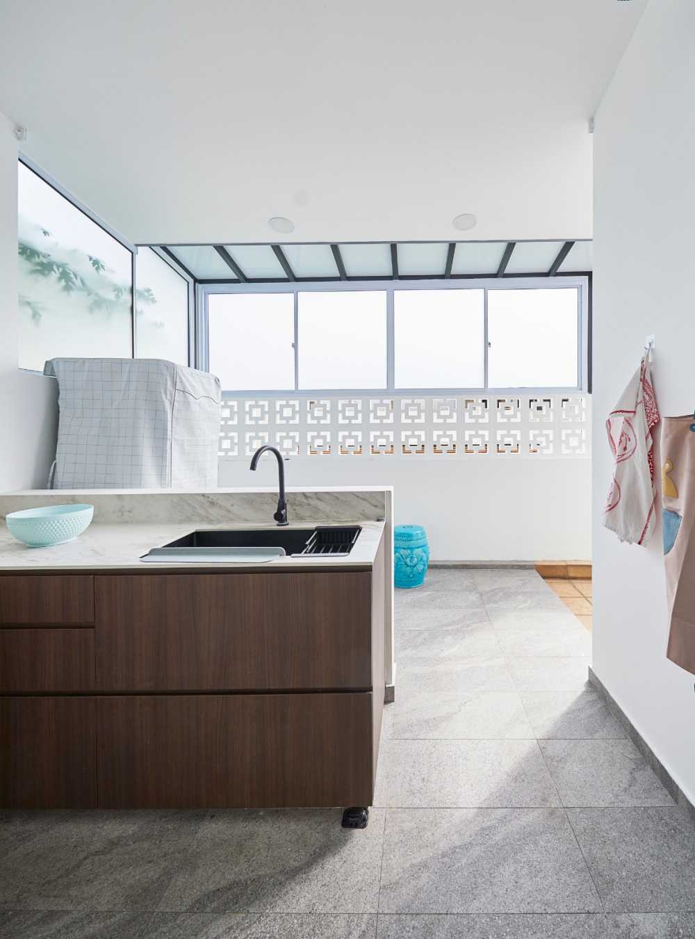 Minimalist Kitchen with Herringbone Tiling and Marble Floor