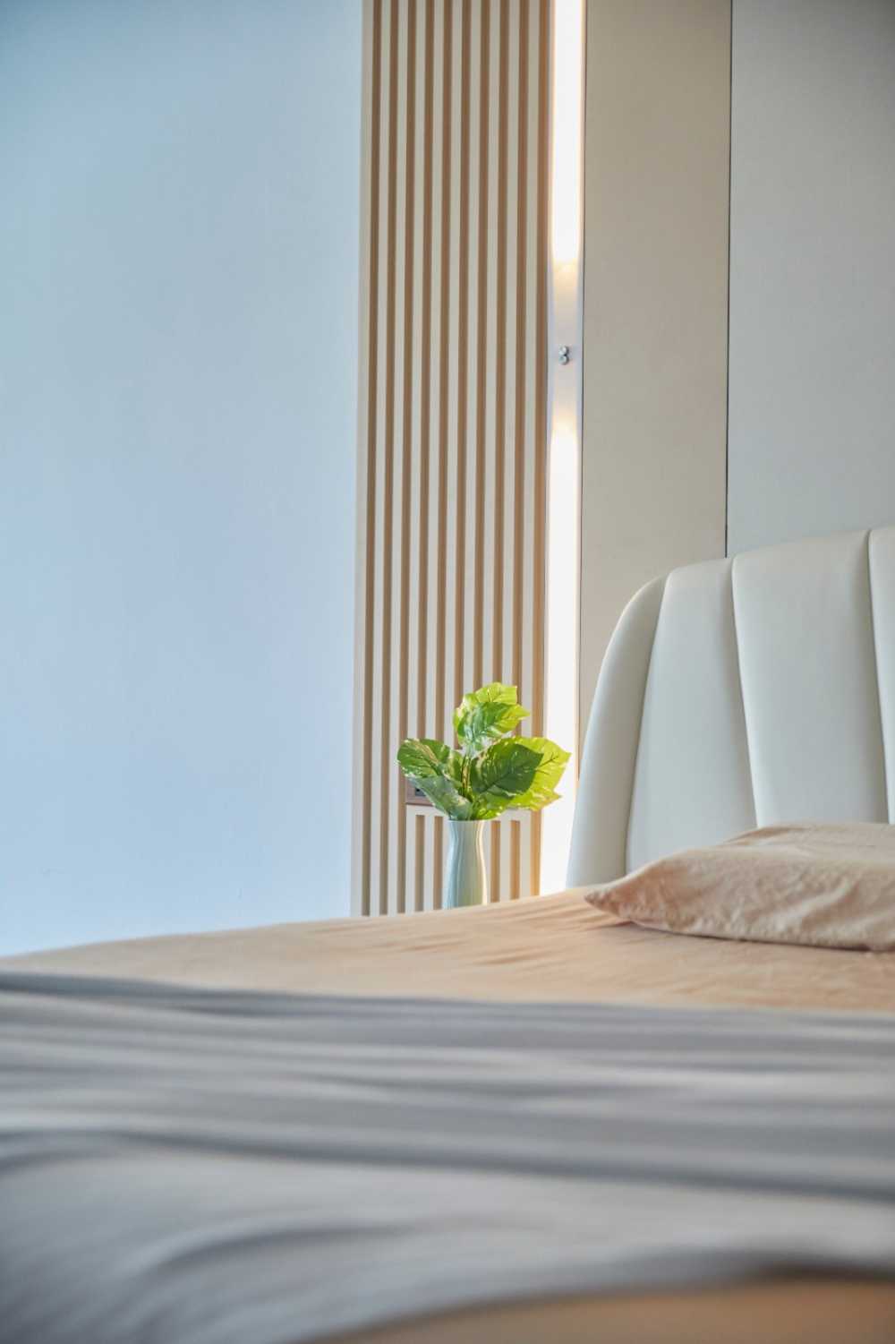 Minimalist Bedroom with Cement Floor and Wardrobe
