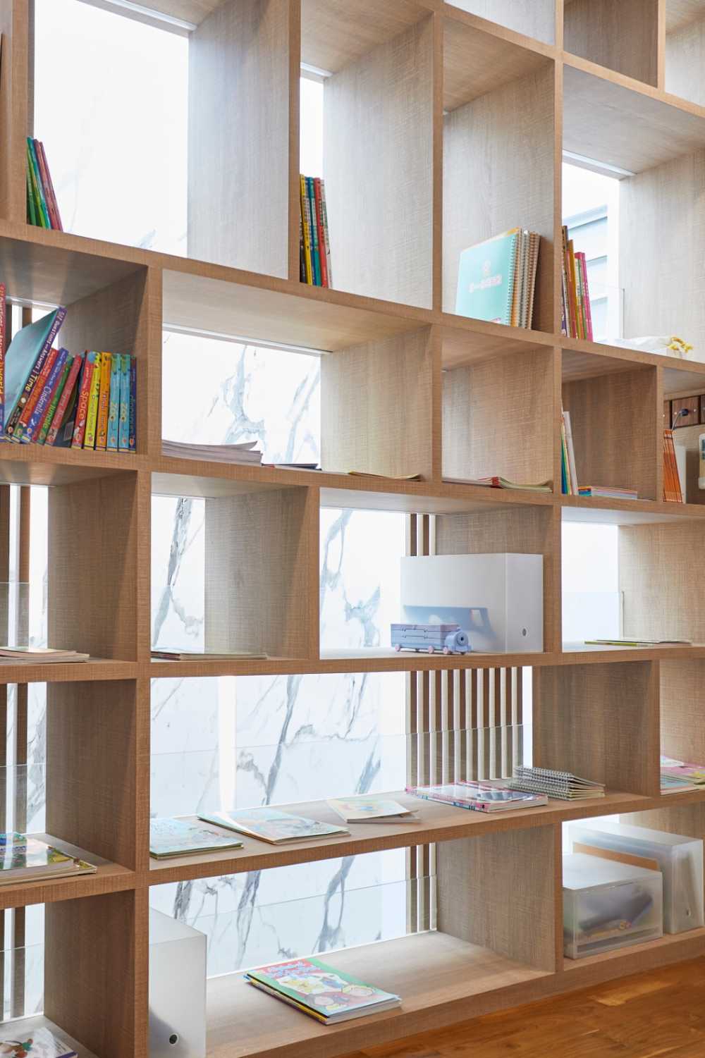 Minimalist Study with Bookshelf and Chandelier