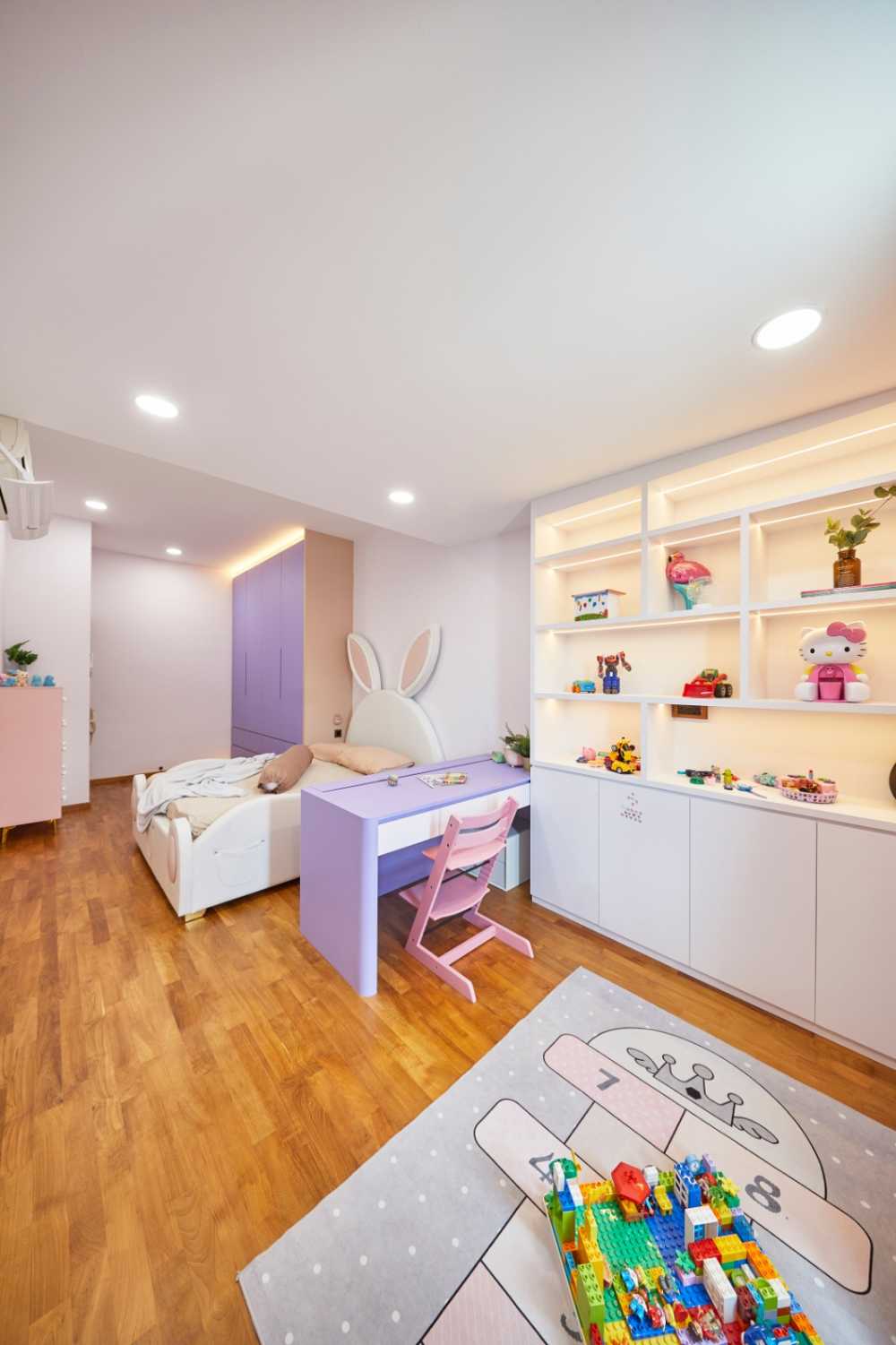 Minimalist Bedroom with Wood Flooring and Bay Window