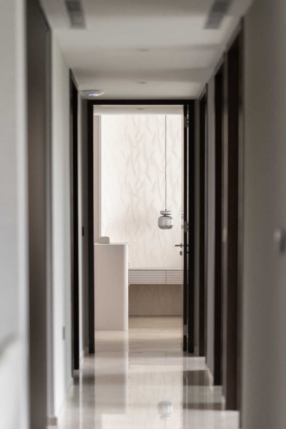 Contemporary Hallway with Artwork and Console Table