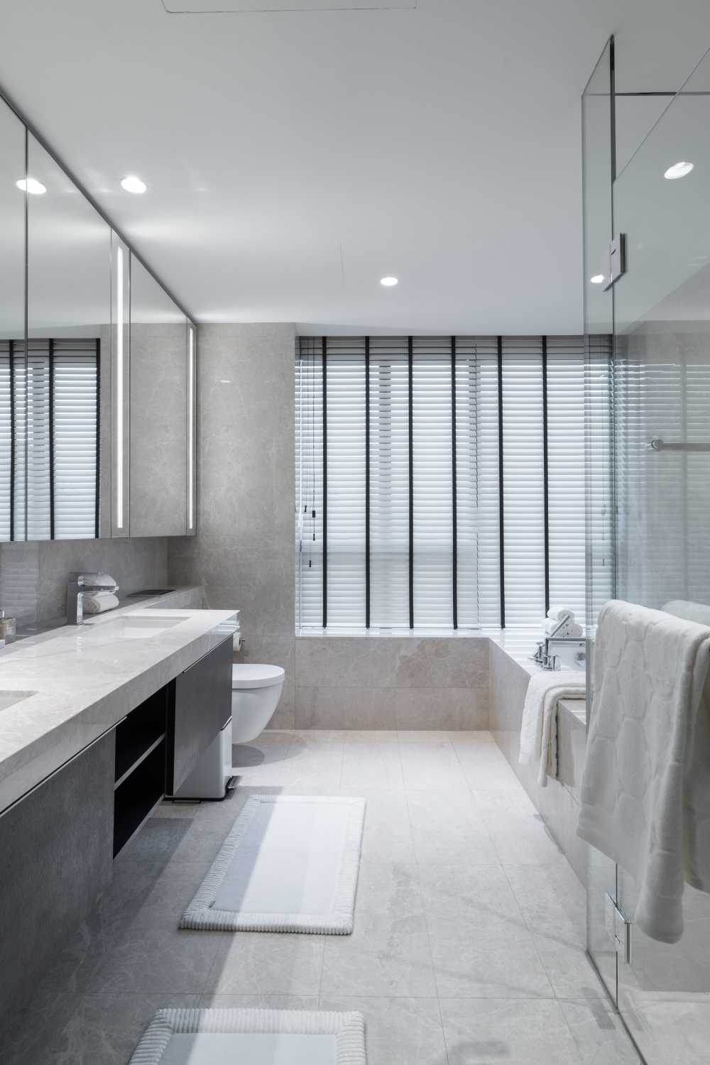 Contemporary Bathroom with Herringbone Tiling and Marble Floor