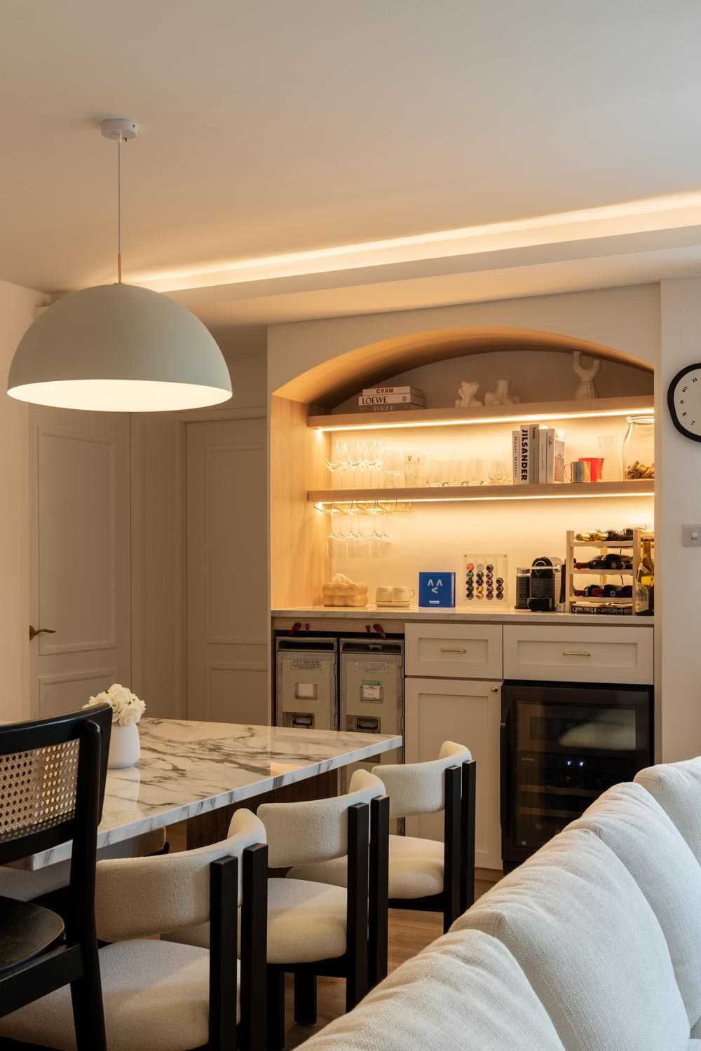Minimalist Dining Room with Drop Light and Dining Table