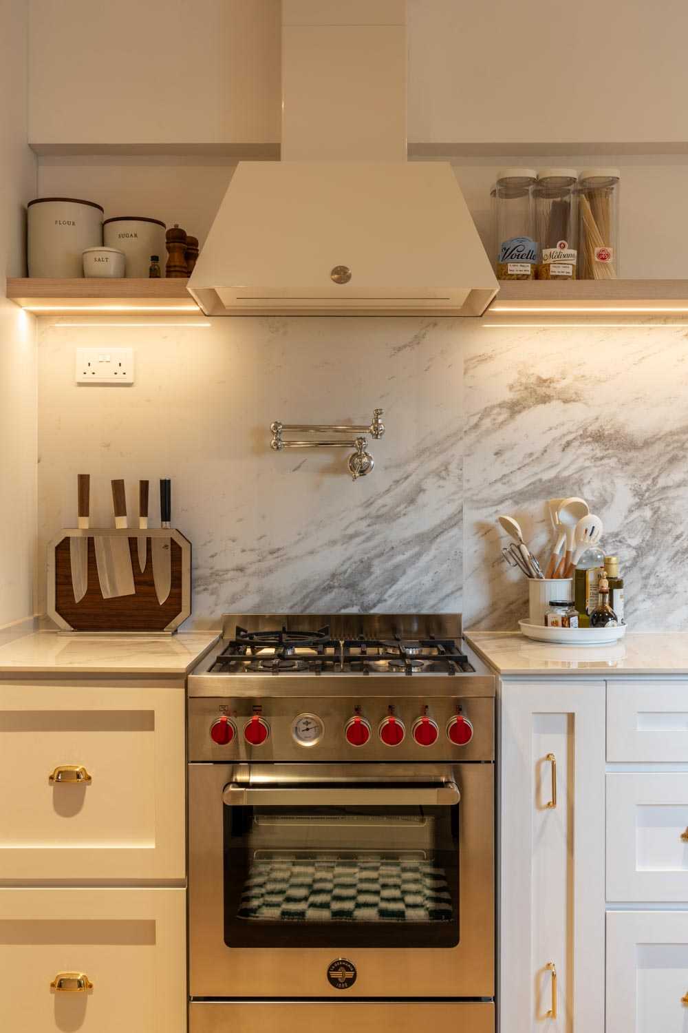 Minimalist Kitchen with Marble Floor and Wood Flooring