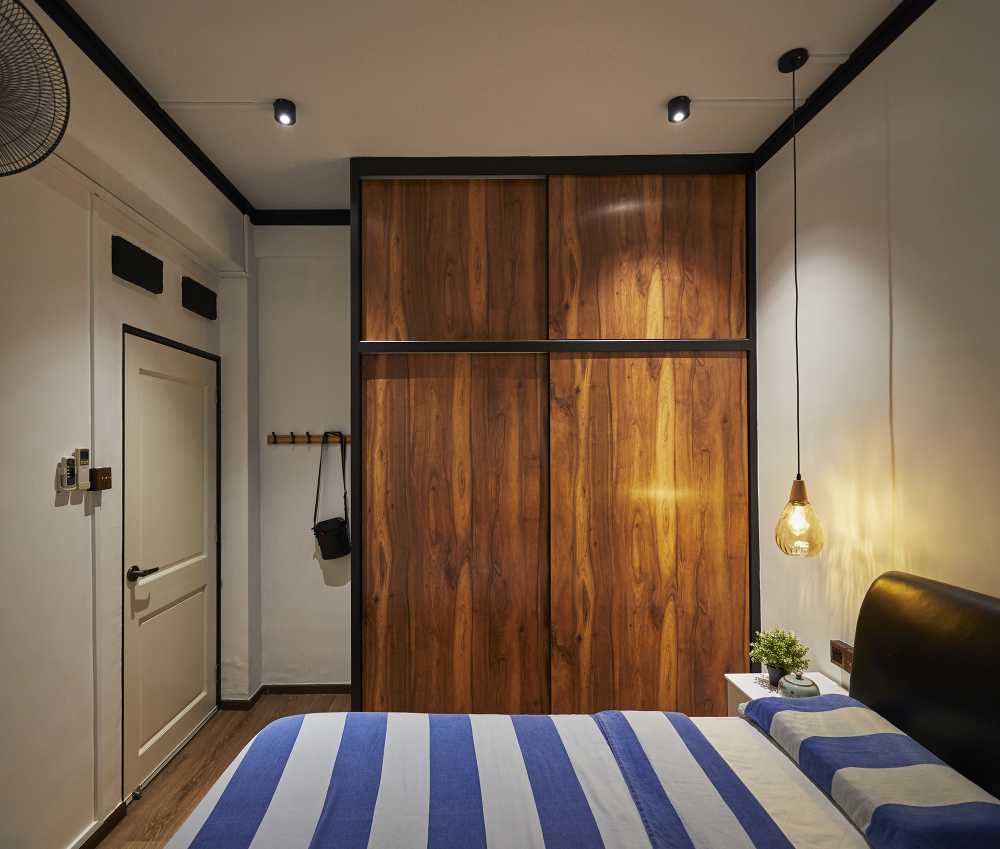 Asian Bedroom with Cement Floor and Bay Window