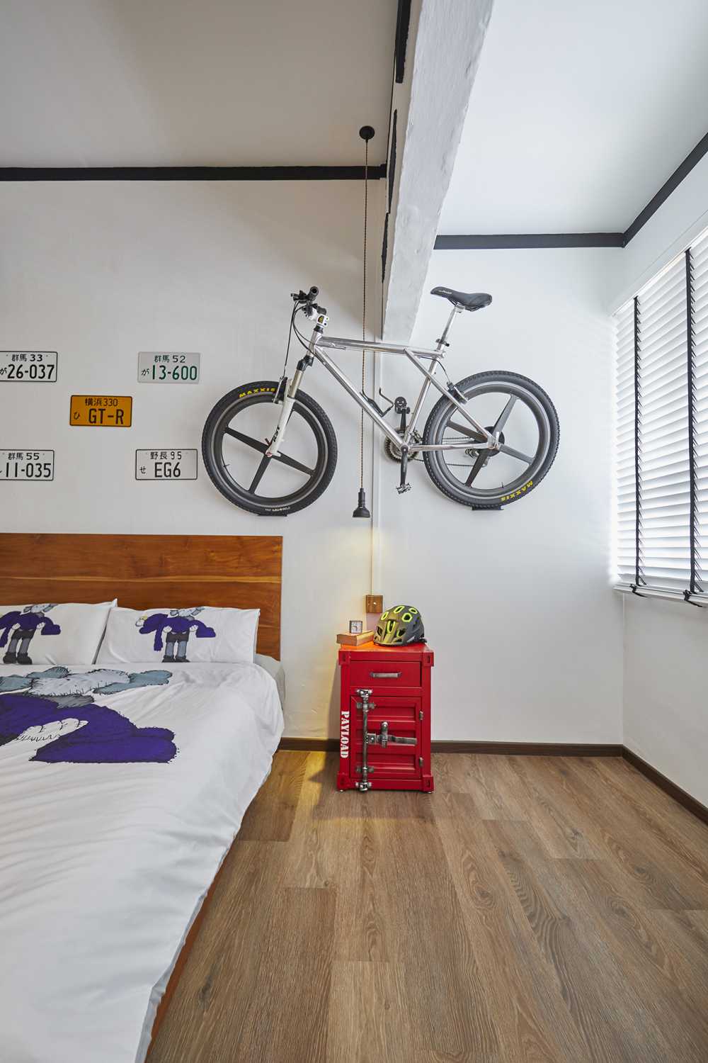 Asian Bedroom with Cement Floor and Wardrobe
