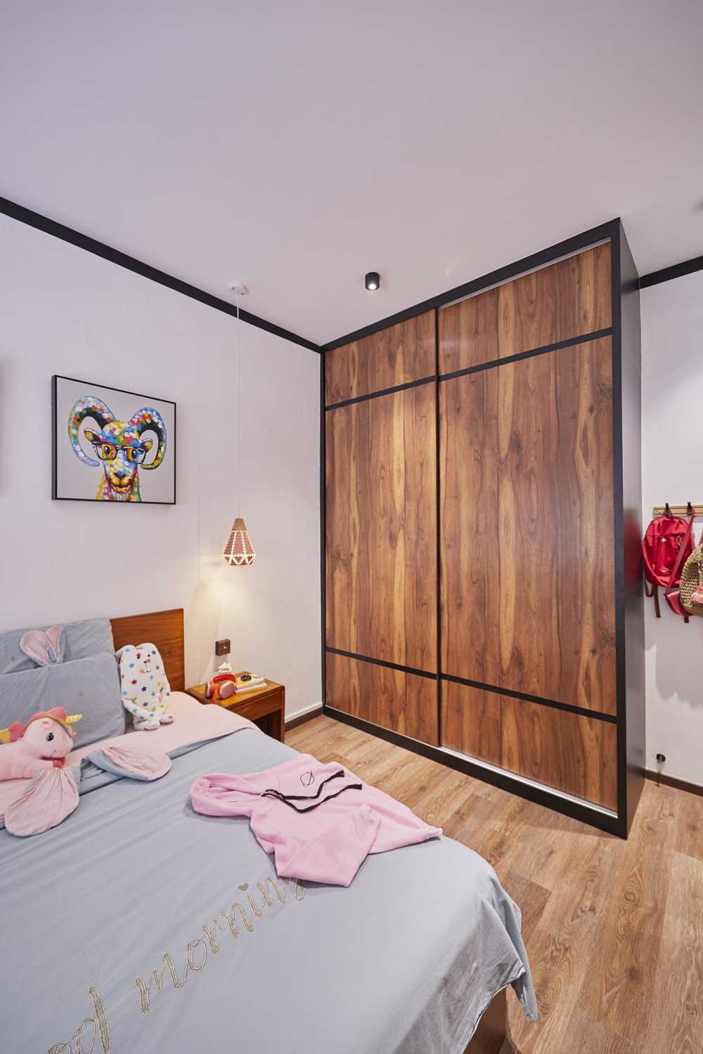 Asian Bedroom with Wood Flooring and Chandelier