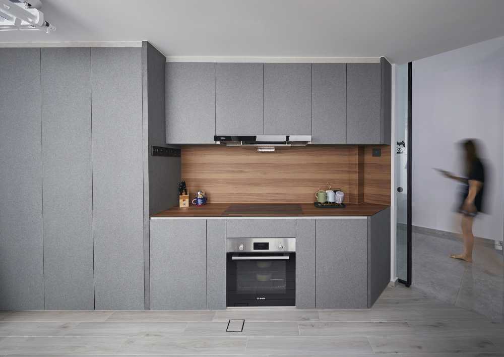 Modern Kitchen with Granite Floor and Kitchen Island