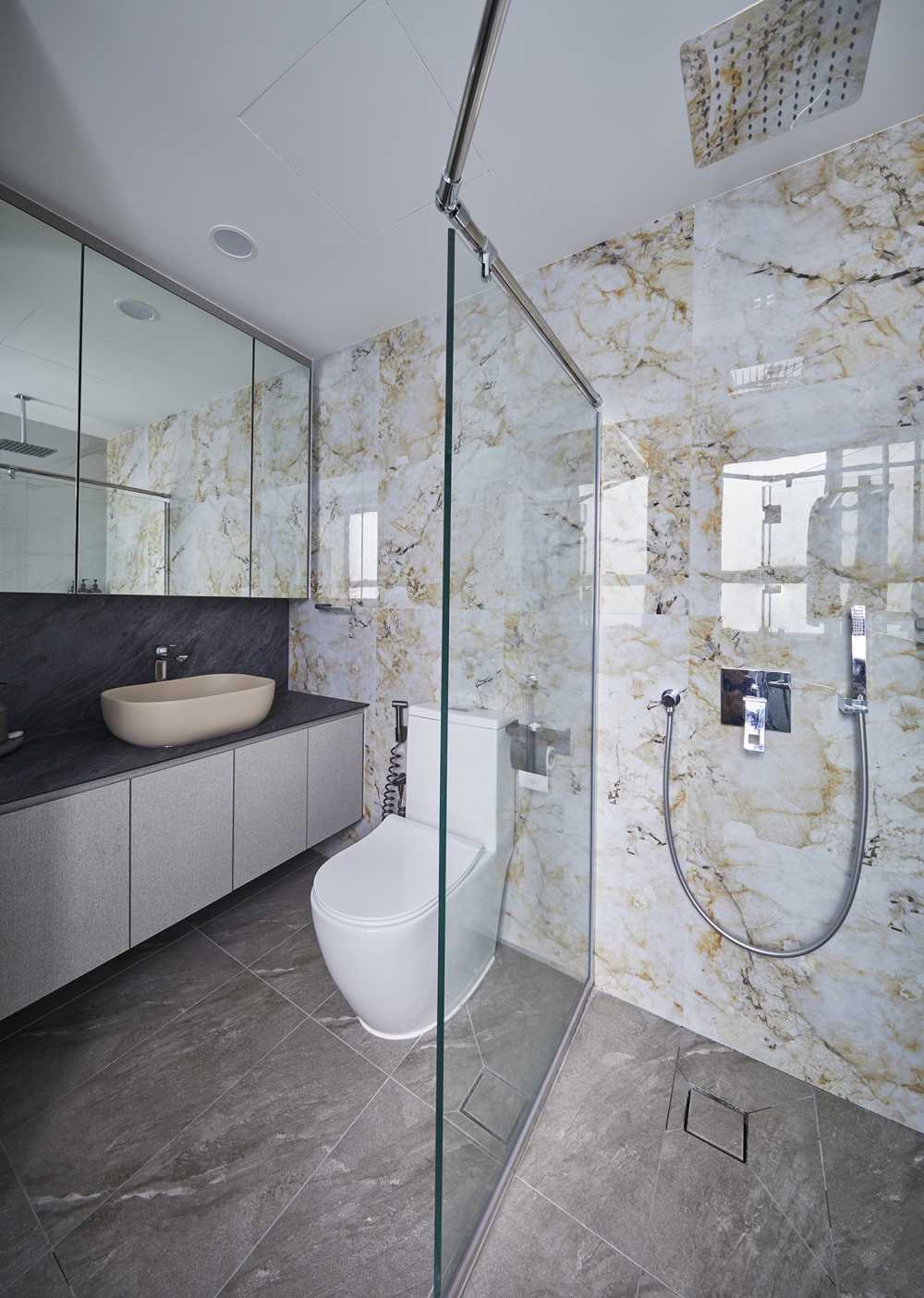 Modern Bathroom with Herringbone Tiling and Granite Floor